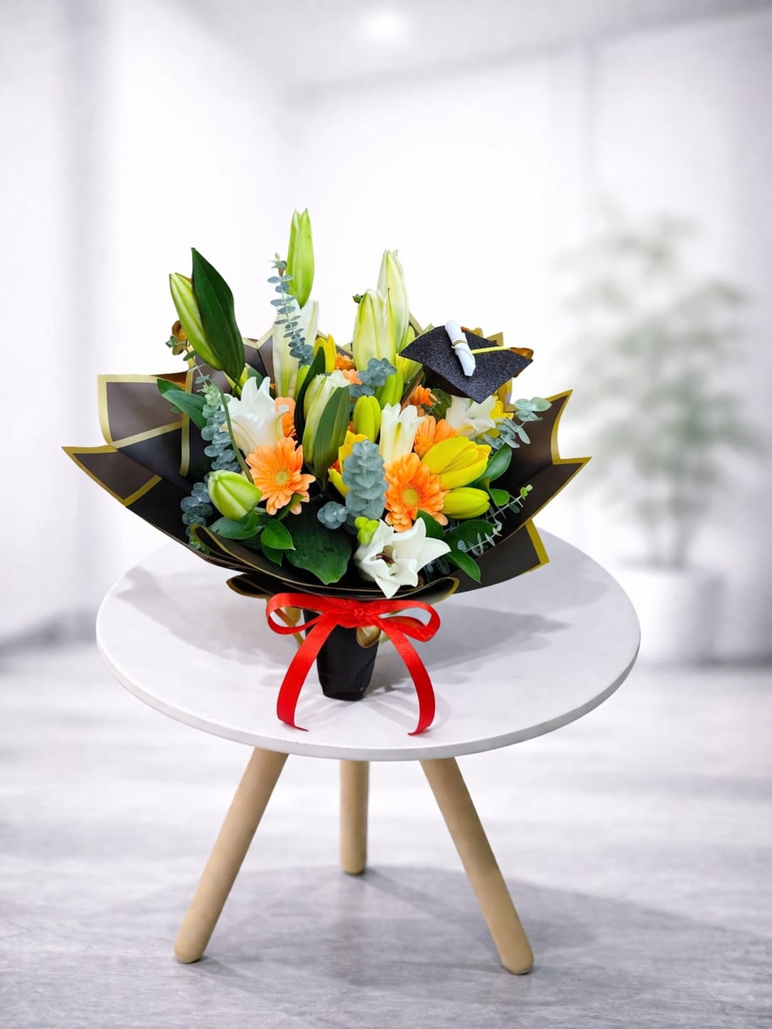 Bouquet de Lirios y Gerberas con Birrete de Grado